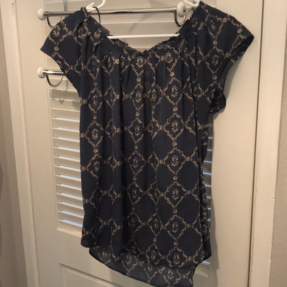 blue blouse with bow in back